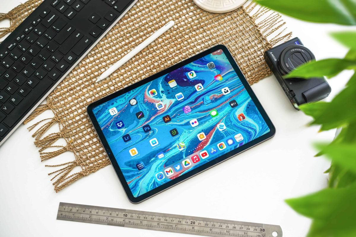 Small business owner choosing the best software for small business on a laptop in 2026